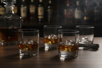 Smoked Glass Whiskey Tumbler Set on walnut bar