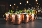 Copper Moscow Mule Mug Set on slate bar surface