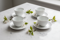 Minimalist Porcelain Tea Cup Set on marble surface